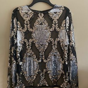 Black, gold, and silver sequins long sleeve evening blouse.